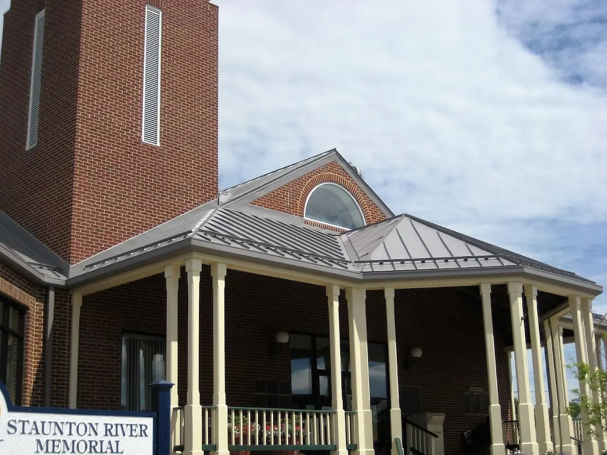 Skilled roofing craftsmen working on a residential roof in Bricksboro